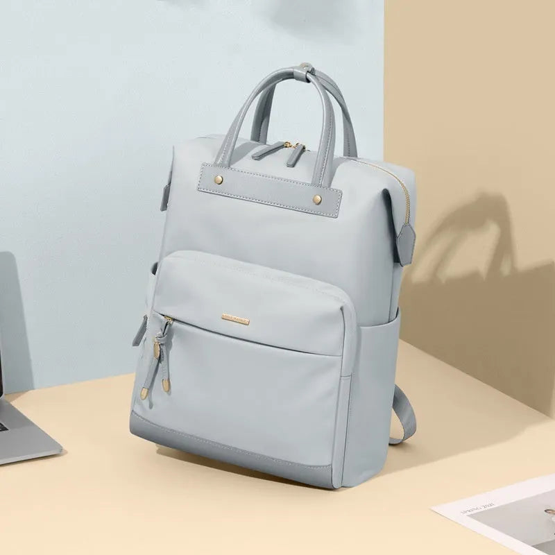Large women's backpack in apricot colour with adjustable shoulder straps showing dimensions