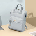 Large women's backpack in apricot colour with adjustable shoulder straps showing dimensions
