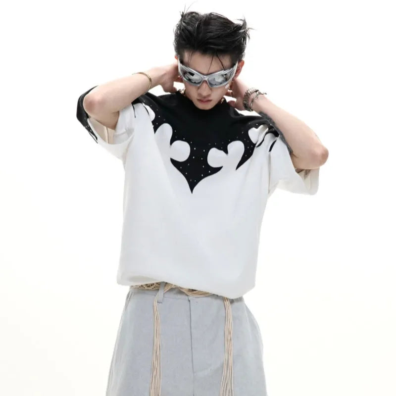 Grey loose-fit men's cotton shirt with short sleeves, drop shoulders, and a detailed burnt flower stitch pattern on the chest.