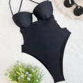 Black solid colour one-piece swimsuit for women made from spandex fabric