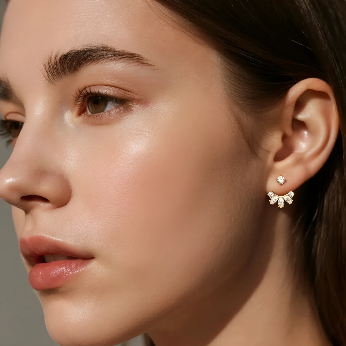 S925 sterling silver two-way geometric earrings in platinum and gold colour options on display