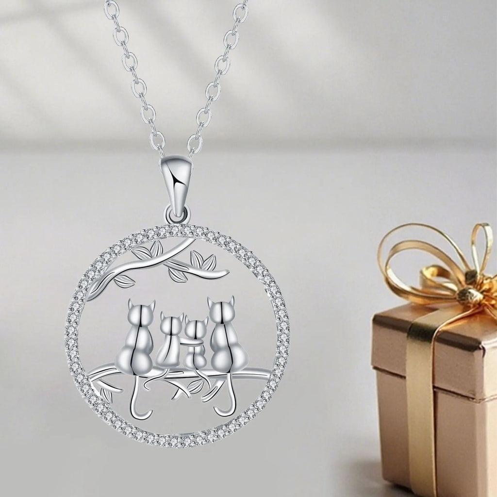 Women's copper necklace with four kitten pendants on cross chain design