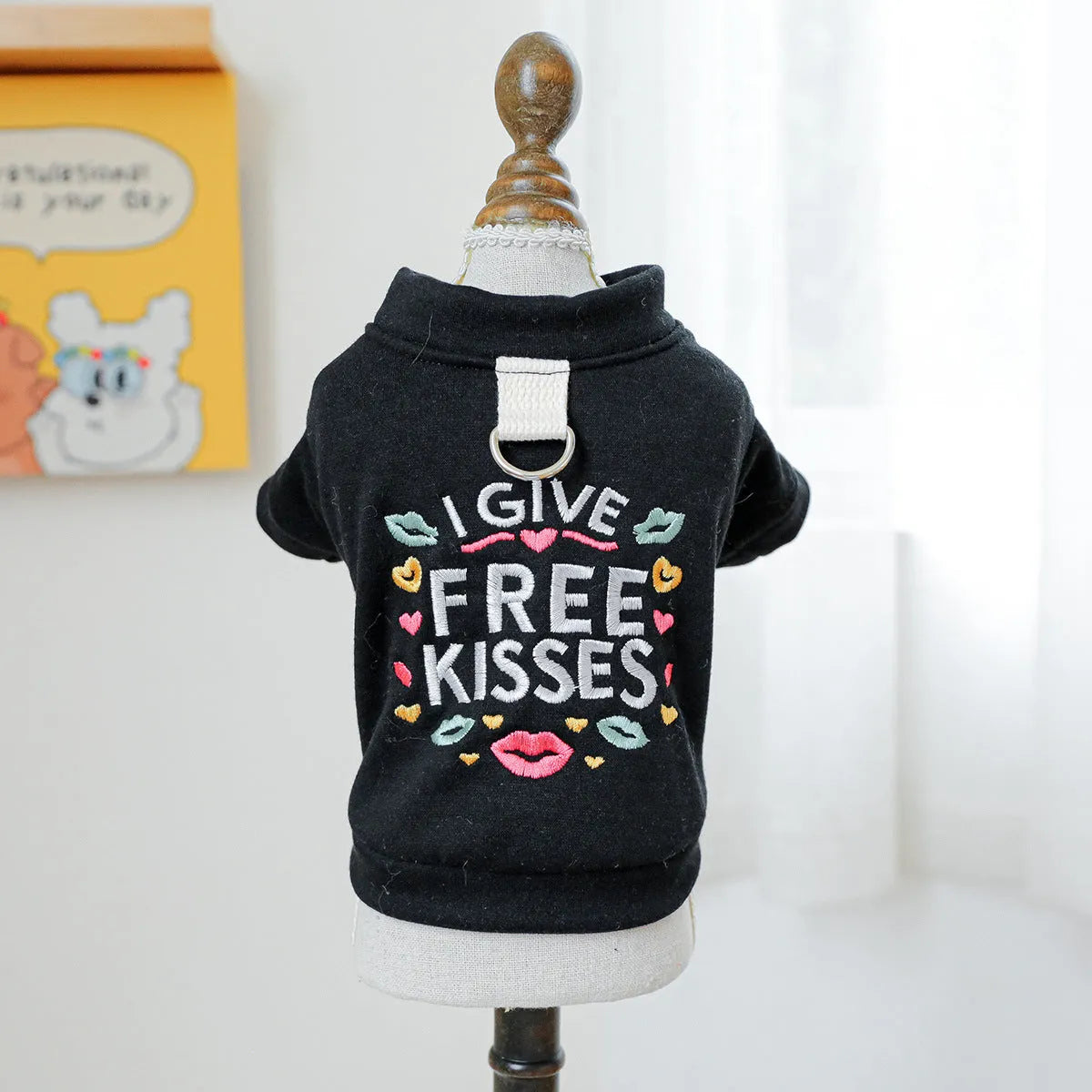 Casual grey kiss sweater design polyester dog jumper for winter on a mannequin.