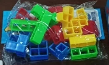Plastic balance stacking board game with 16 coloured blocks, chassis, and base on a 26.5cm square box.