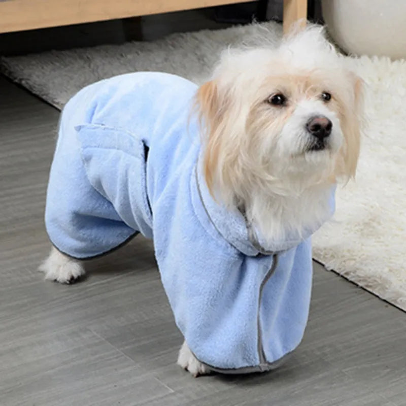 Blue microfiber pet drying towel bathrobe for dogs and cats on a light background