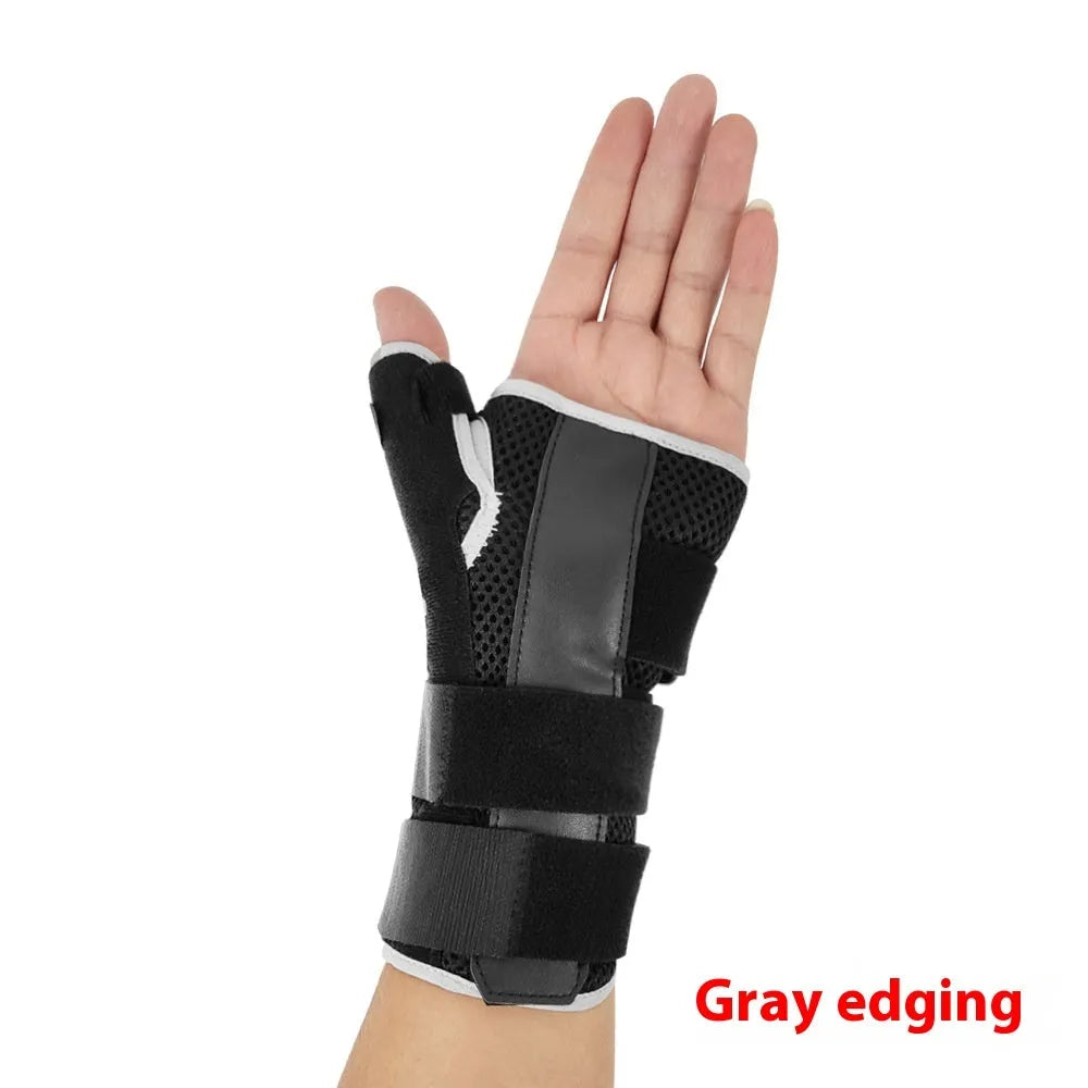 Black carbon fibre sports wrist guard with grey edging and an adjustable thumb strap