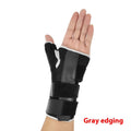 Black carbon fibre sports wrist guard with grey edging and an adjustable thumb strap