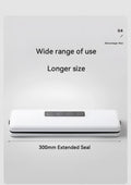 White automatic vacuum sealer machine on a kitchen counter
