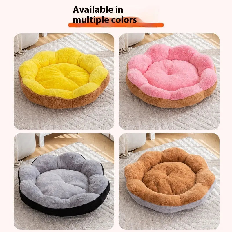 Round grey and black cloth cat bed with thick sides and a soft, detachable rabbit plush decoration on the rim.