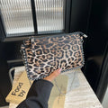 Western style niche casual crossbody underarm women's bag in dark brown with chain detail, horizontal square shape