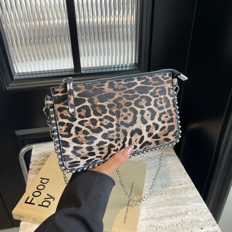 Western style niche casual crossbody underarm women's bag in dark brown with chain detail, horizontal square shape