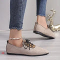 Beige leopard print pointed toe court shoes for women with a low block heel, shown in a plus size fit.