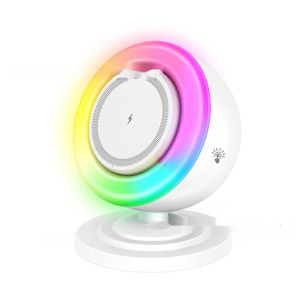 Three-in-one wireless charger with Bluetooth speaker and coloured lights in white finish on a desk