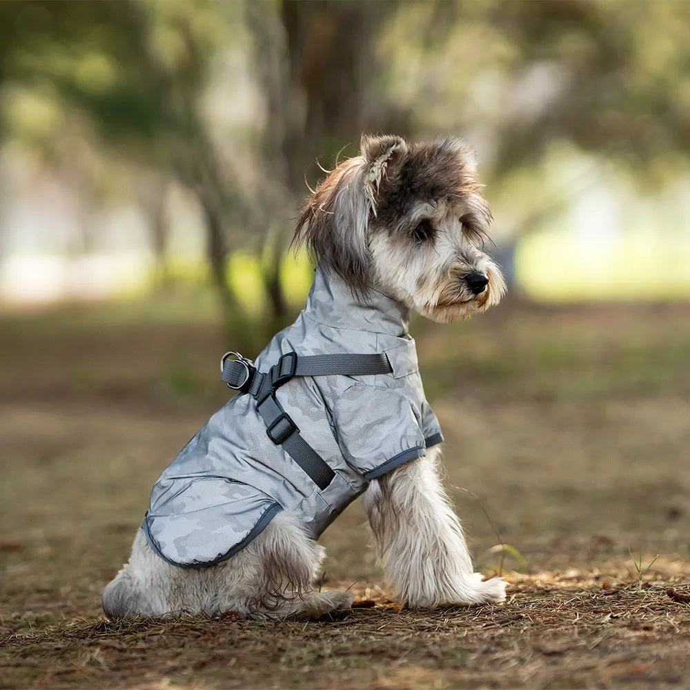 Waterproof dog raincoat in camouflage colour with two leg openings for chest and back coverage, polyester material, casual style