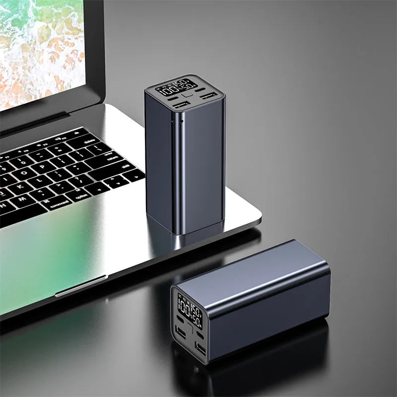 65W metal power bank with 20000mAh capacity for laptop charging, shown in black, blue, and grey colour options.
