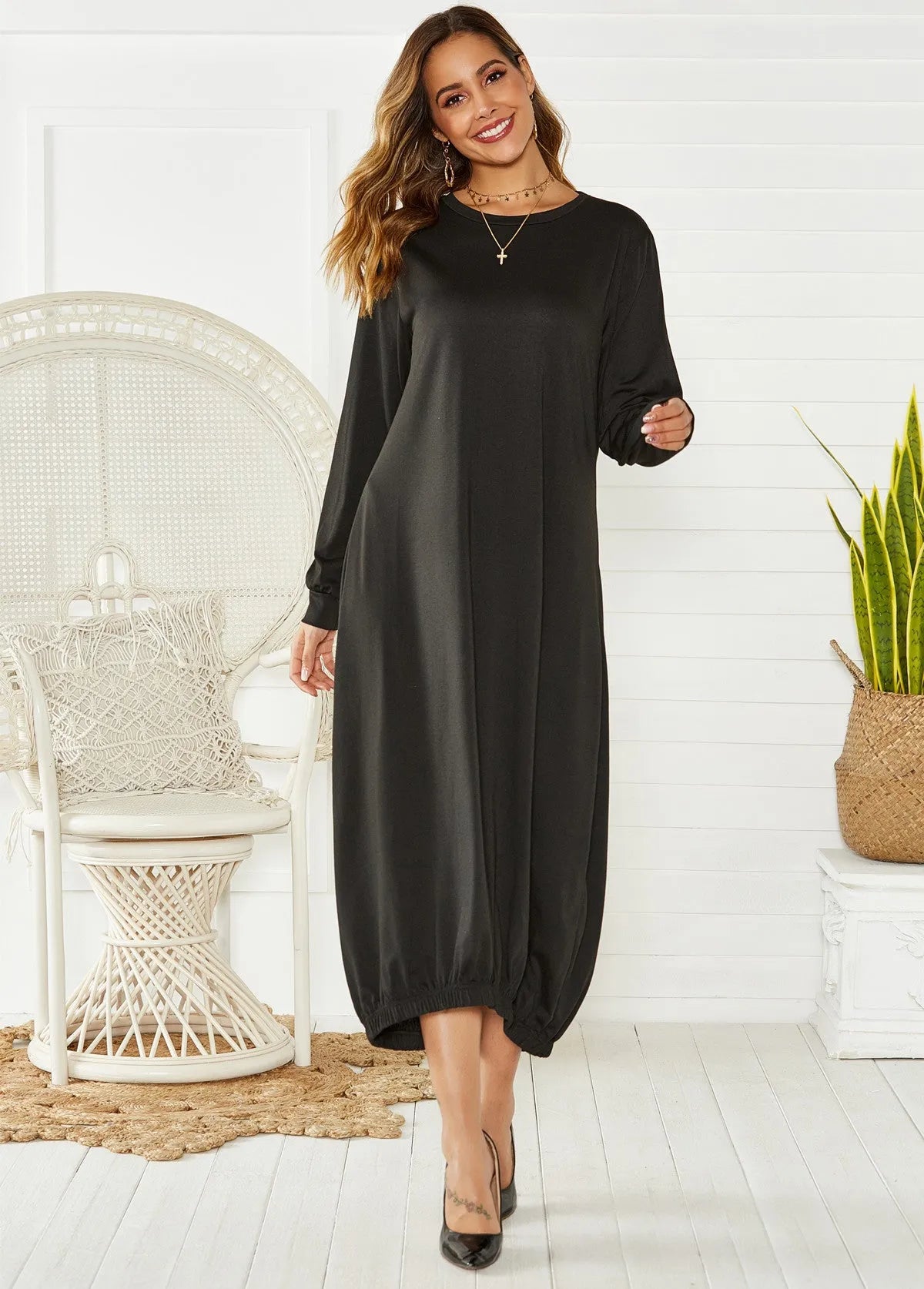 Black loose long lace-up crew neck lantern skirt dress on a hanger