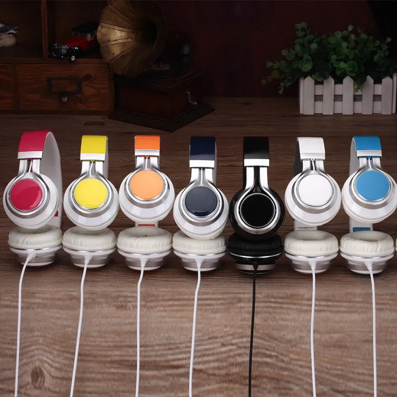 Wired head-mounted computer headset with heavy bass, microphone, and 3.5mm plug in multiple colours