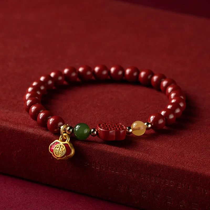 Happy Eyebrow Bracelet with fu charm in emperor sandstone colour, available in 6mm and 8mm sizes.