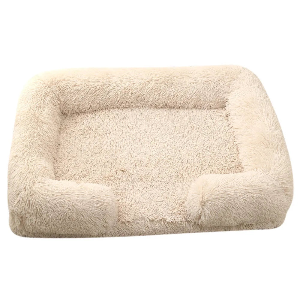 Round plush dog bed with raised rim and removable inner sleeve in beige brown colour