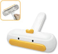 Portable yellow duck design pet hair remover tool with bristles for furniture and car seats.