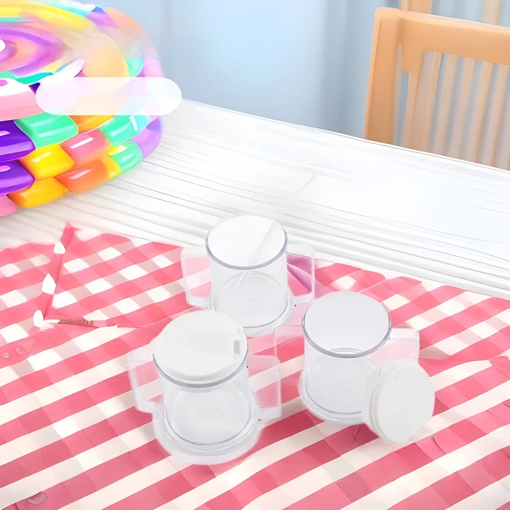 Transparent plastic drinking cup with spill-proof design on a plain background.