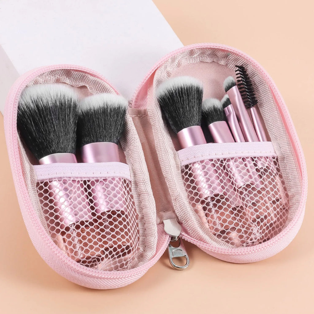 10-piece makeup brush set with crystal handles, aluminium tubes, and fibre bristles in a storage bag