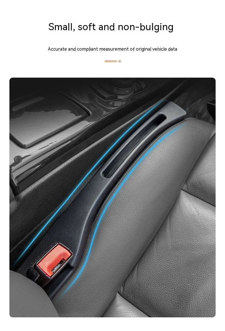 Black plastic car seat gap storage box organising items between vehicle seats