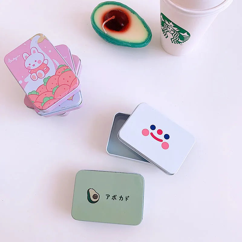 Small iron storage box with apple girl design on a white background, dimensions 9.5cm x 2.4cm x 6.5cm
