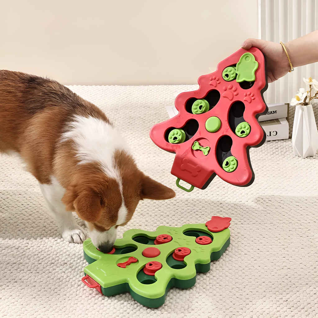 Green Christmas tree interactive dog puzzle slow food bowl with non-slip base on wood floor