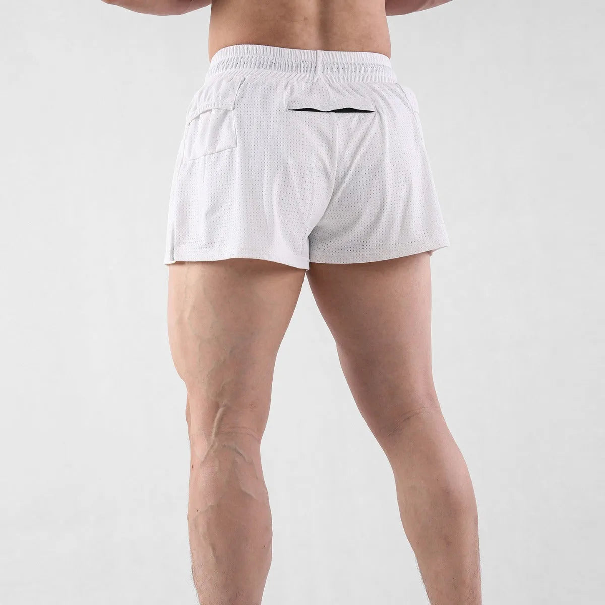 Men's white and black quick-drying nylon shorts for summer sports.
