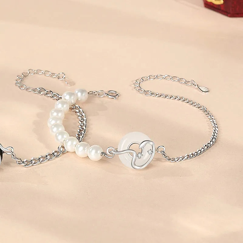 925 sterling silver bracelet with snake zodiac motif, obsidian pearl, and safe buckle in New Chinese style