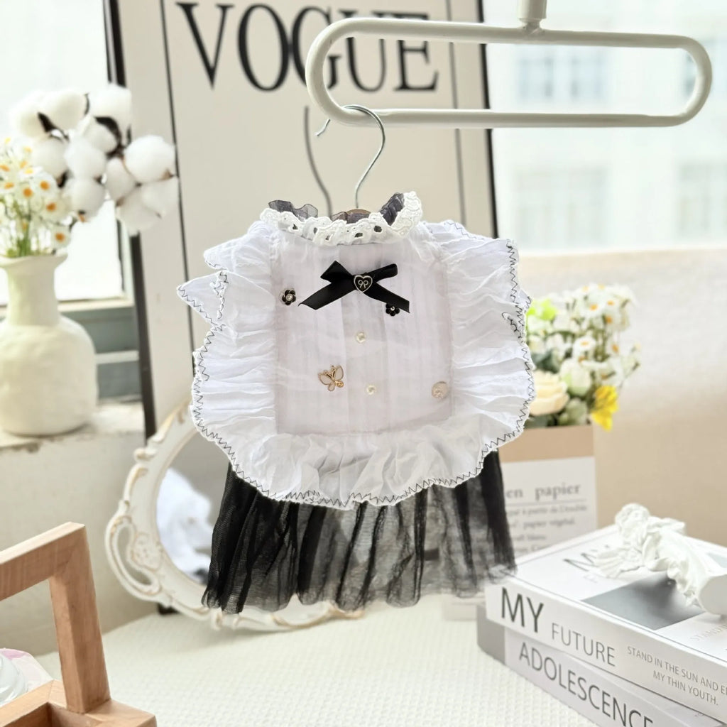 White polyester gauze skirt dog dress on a small dog, showing princess-style gathered skirt.