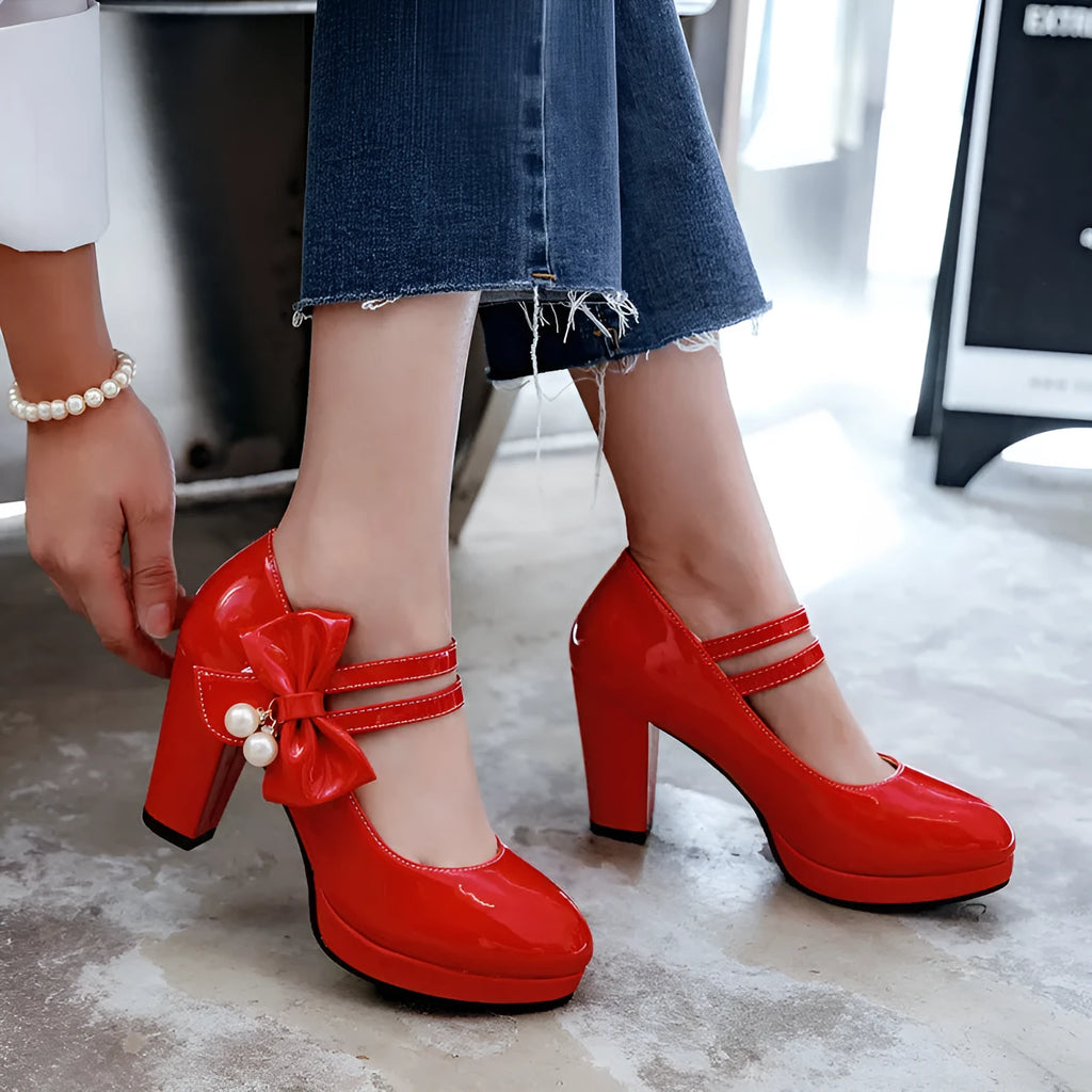 Women's waterproof platform shoes with chunky heels in red colour with round toe and buckle closure