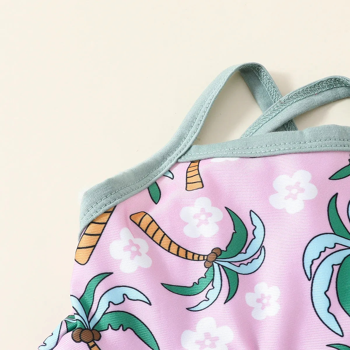 White children's two-piece swimsuit set with shirt and shorts, suitable for ages 6 months to 3 years.