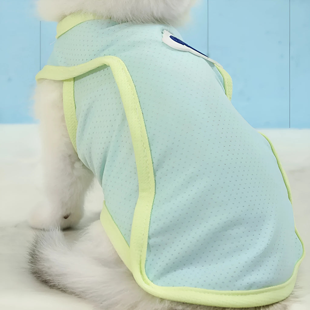 Grass green sleeveless vest for a cat, made from thin polyester fabric, on a white background.