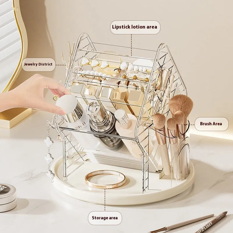 Clear plastic rotating makeup storage box organiser with 360-degree spin base on a dressing table.