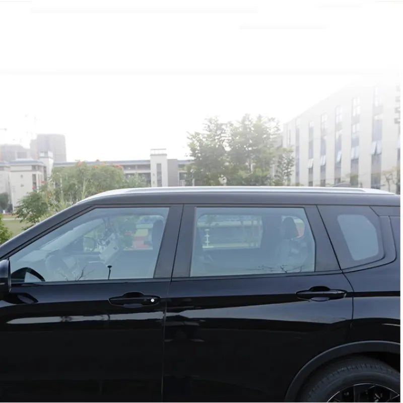 Set of black and carbon fibre pattern adhesive protective films for 23 Mitsubishi Outlander window pillars.