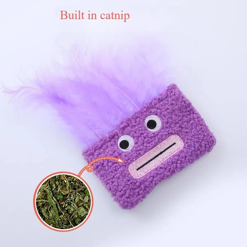 Colourful big mouth explosion head-shaped plush cat toy shown in blue, green, orange, and purple.