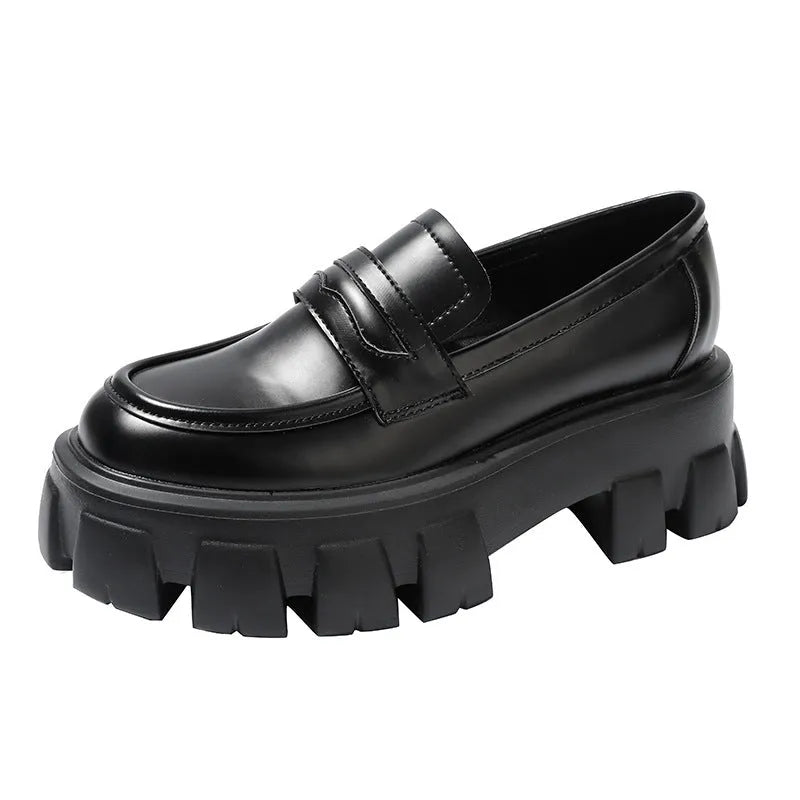 British style wide fit loafers in patent leather and matte finishes on a muffin base rubber sole.