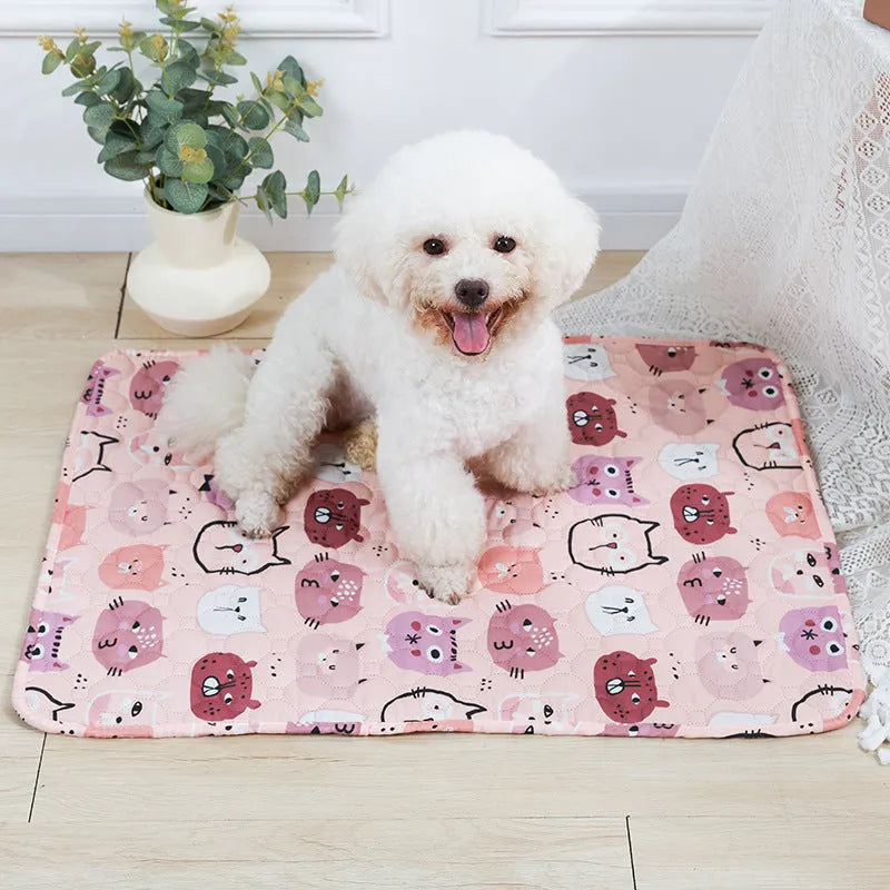 Reusable waterproof pet training pad with animal print design, shown in multiple sizes on a floor.
