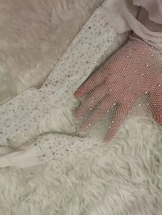 Women's diamond-pattern mesh fishnet ankle socks in black, white, and skin colour on a plain background.