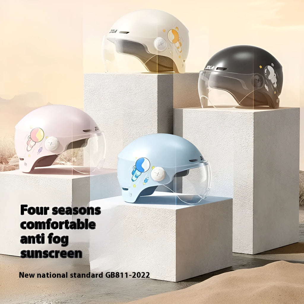 Khaki coloured open-face motorcycle helmet with a mirrored sun visor attached on a table.