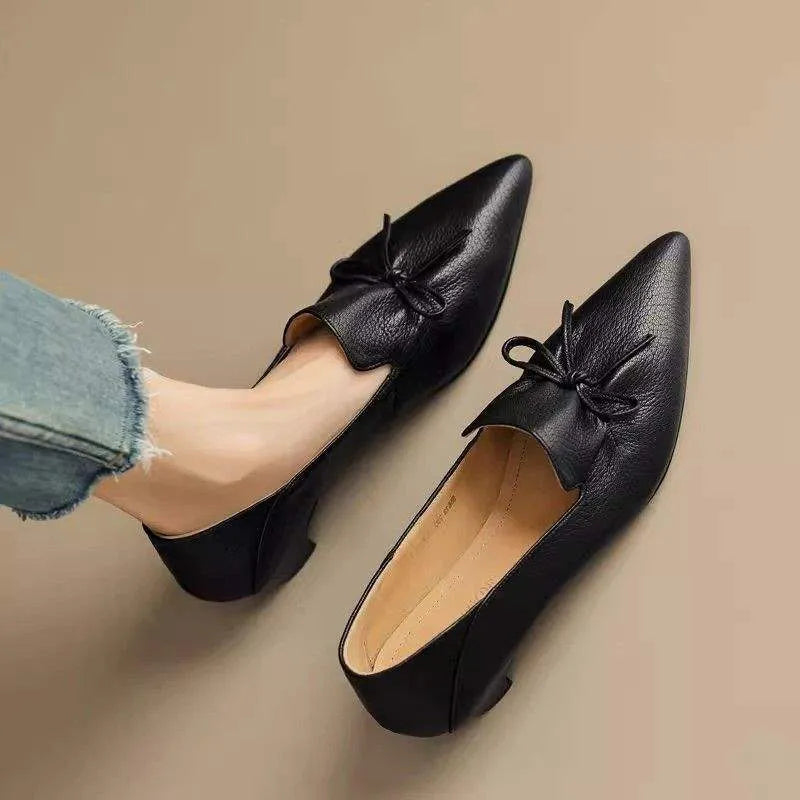 Women's low heel pointed toe shoes in black with PU upper and soft surface finish