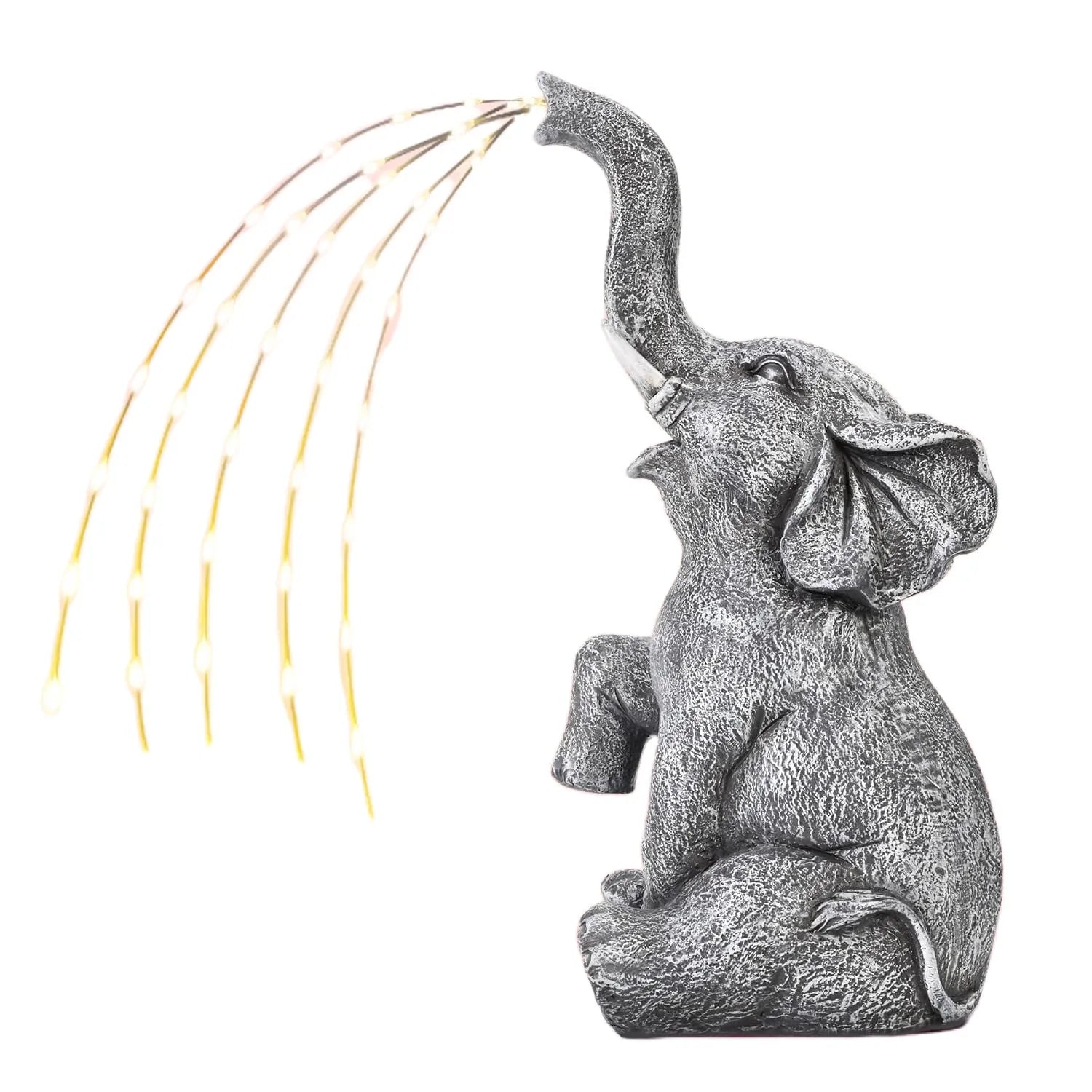 Outdoor resin elephant garden statue with integrated light strip on grass.