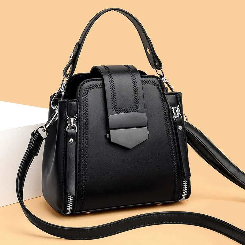 Soft PU leather ladies small handbag with square vertical shape and sewing thread detail