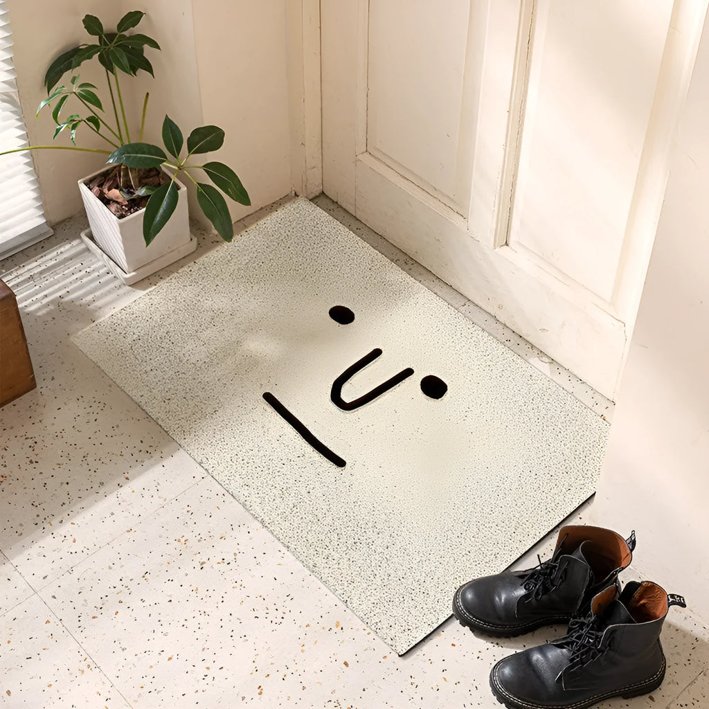 Cartoon facial expression PVC floor mat with Mr. Big Nose geometric pattern, shown in a square shape with a wire ring border.