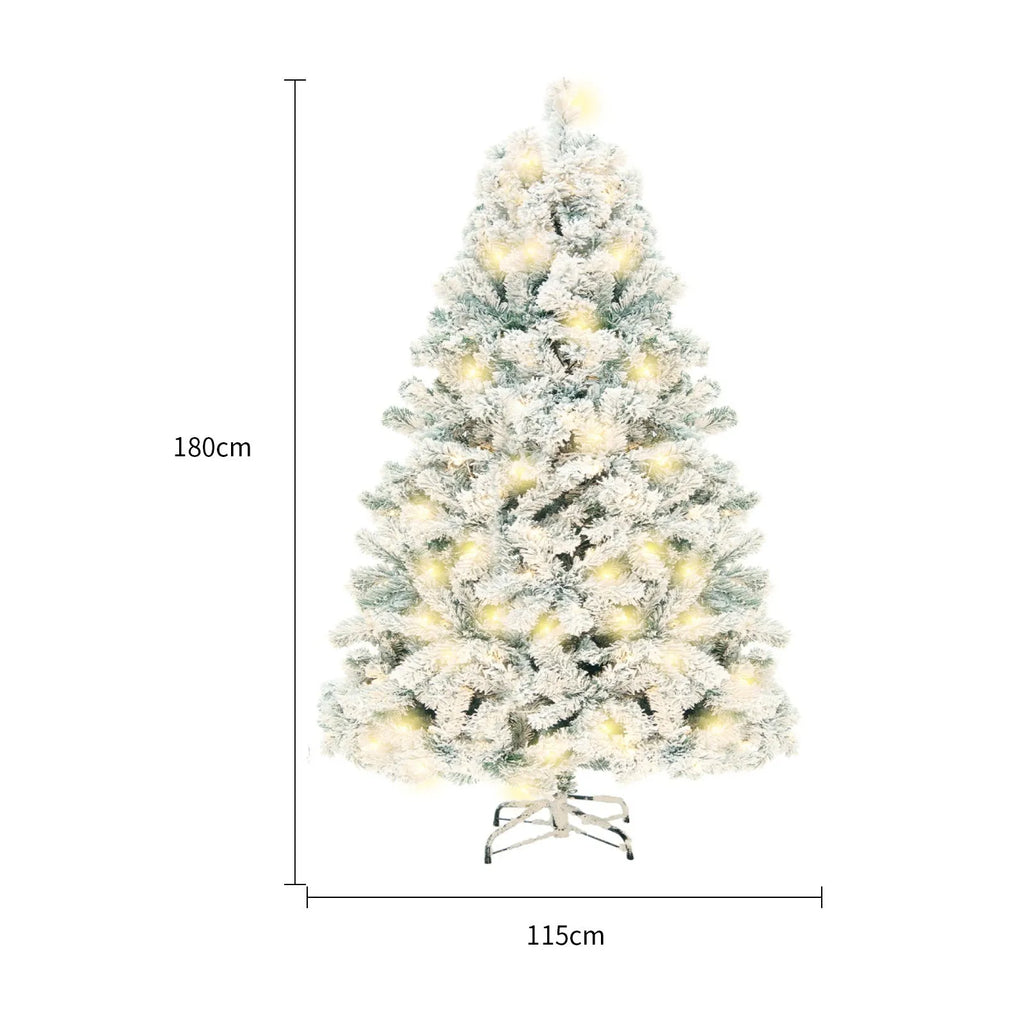 Green and white snow-covered artificial PVC Christmas tree with metal stand