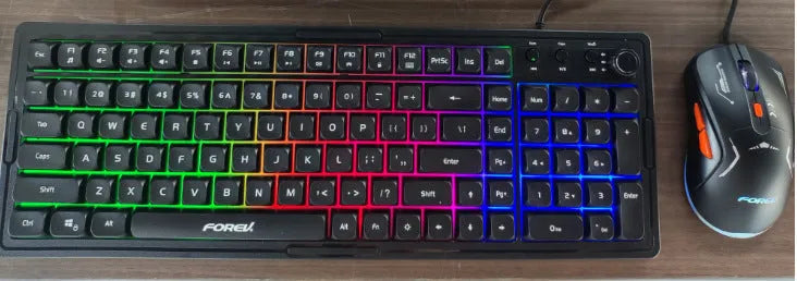 Custom mechanical keyboard and wireless mouse in selected colour option with backlight illumination.