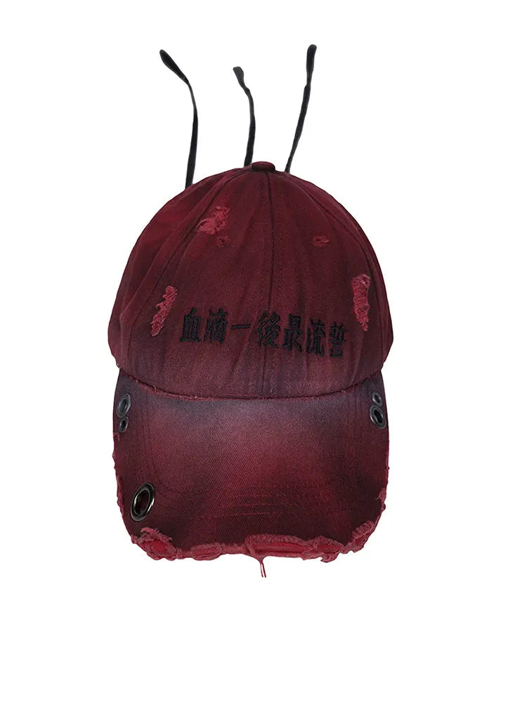 Rose red cotton peaked cap with a curved peak and adjustable rear strap on a neutral background.