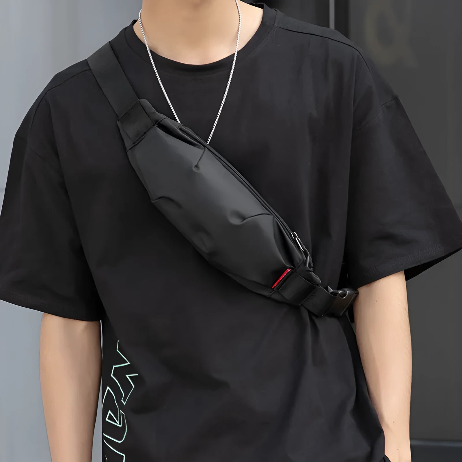 Black oxford cloth waist pack showing front zip and interior phone and ID pockets.